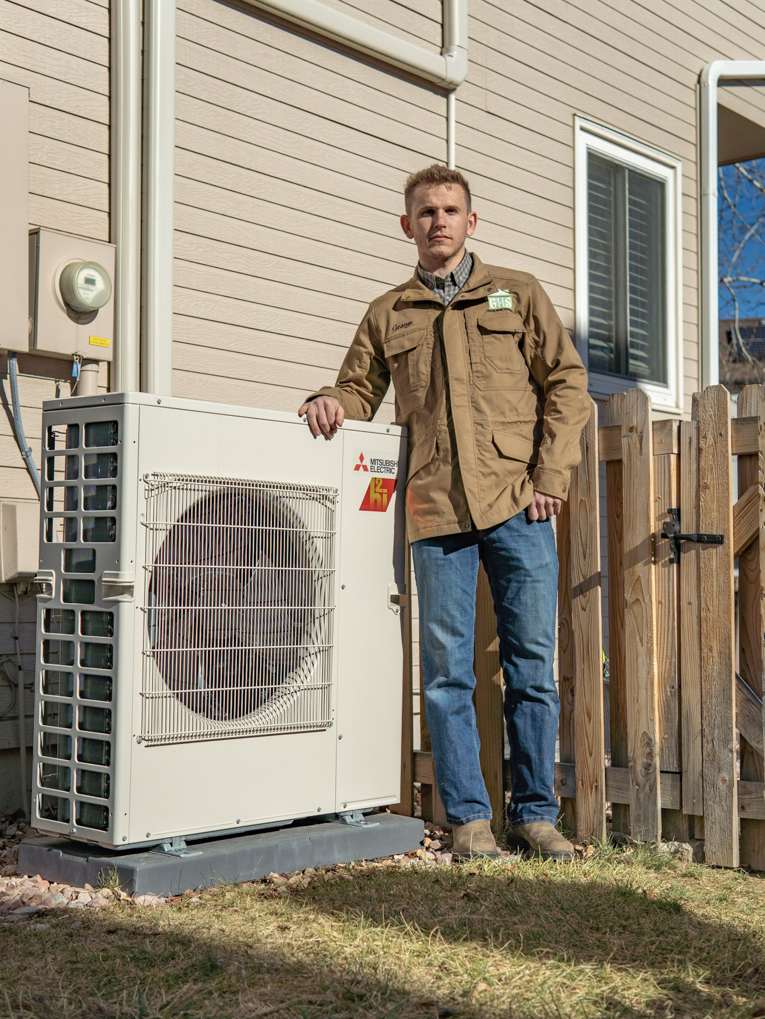 George stands next to a Mitsubishi unit he installed for Paul Katz.